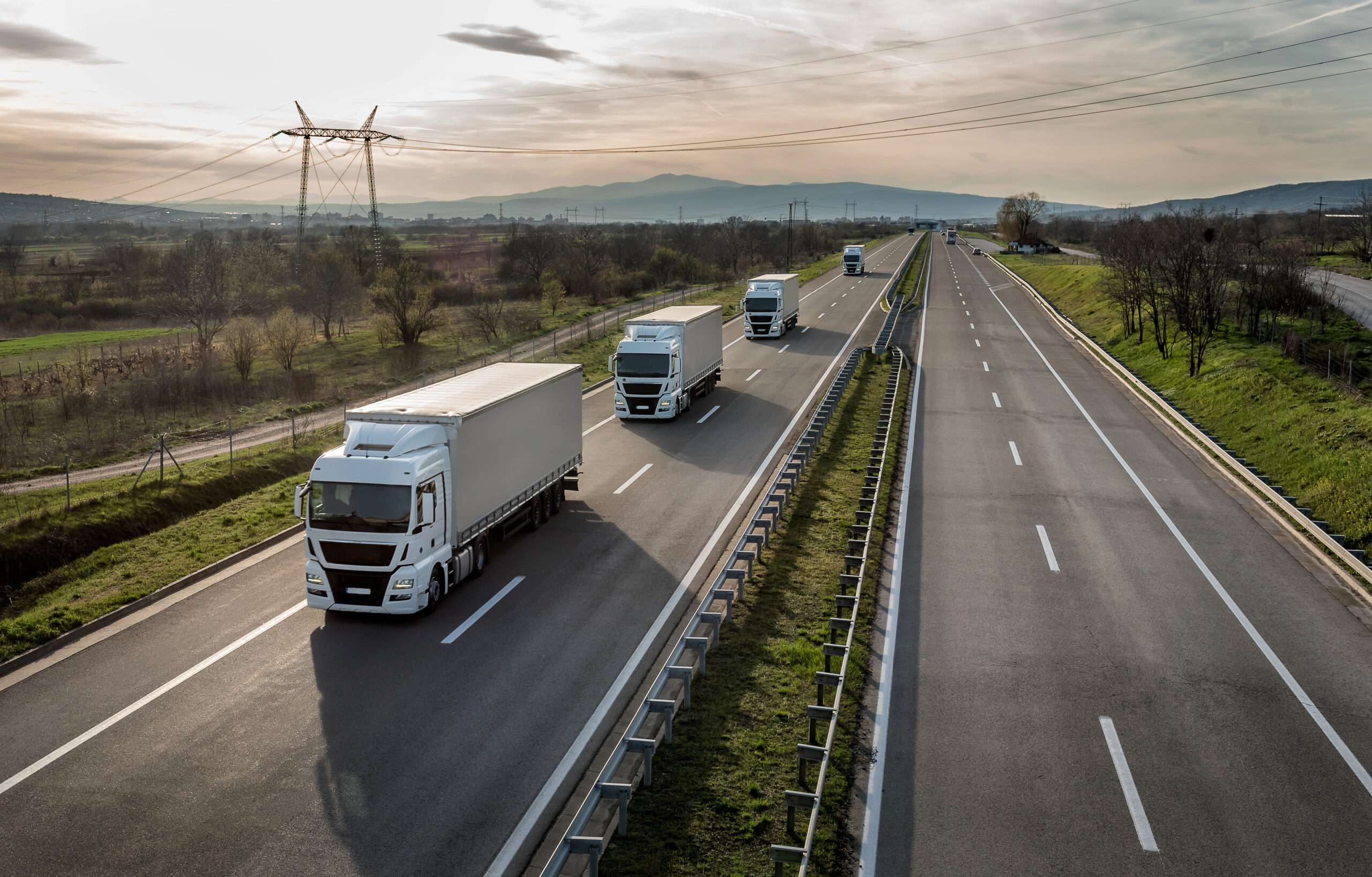 freight on trucks being transported to aircrafts